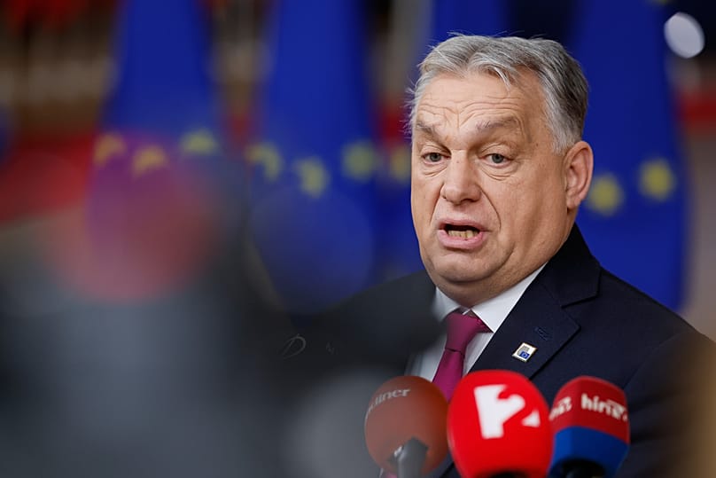 Hungary's Prime Minister Viktor Orbán speaks with the media as he arrives for the EU Summit in Brussels, 18 December, 2025