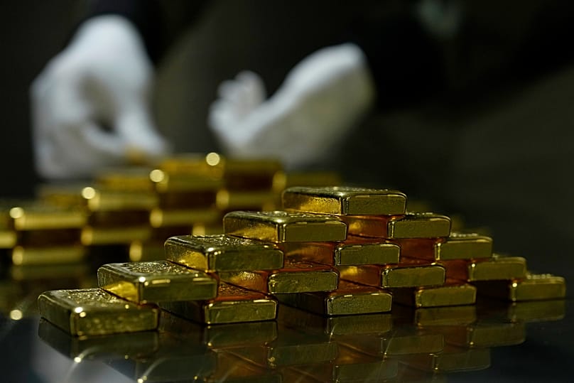 250 gram gold bars of 999.9 purity are stacked in the safe deposit boxes room in Munich, 25 April, 2025