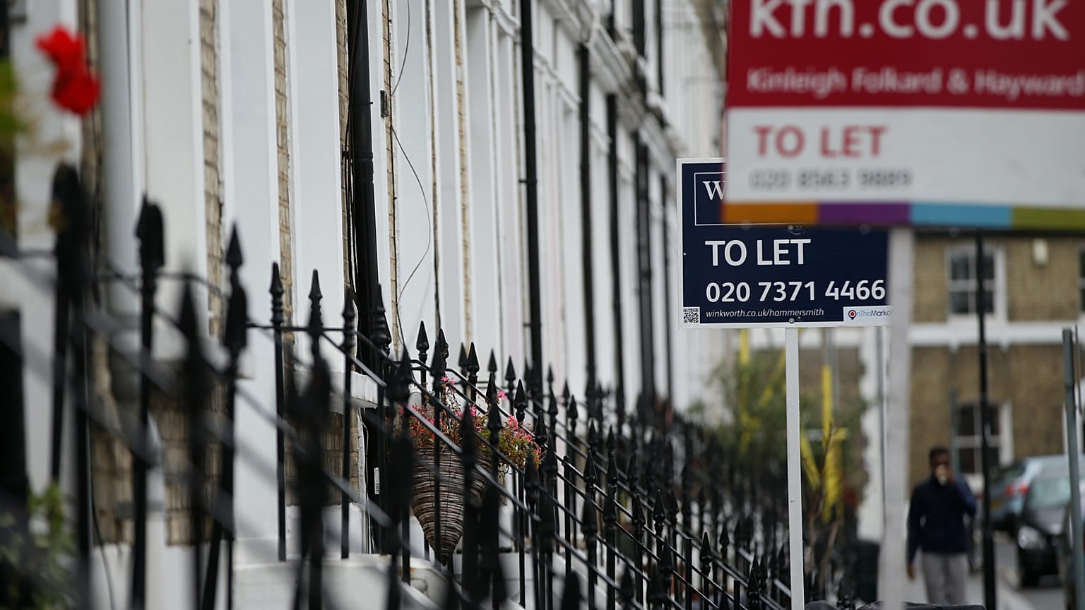 FILE. To Let signs stand next to a properties in west London. 2 Aug. 2016.