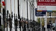 FILE. To Let signs stand next to a properties in west London. 2 Aug. 2016.