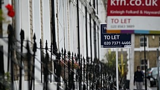 FILE. To Let signs stand next to a properties in west London. 2 Aug. 2016.
