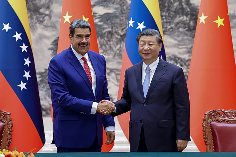 Venezuela's President Nicolás Maduro shakes hands with his Chinese counterpart Xi Jinping during a meeting in Beijing, 13 September, 2023