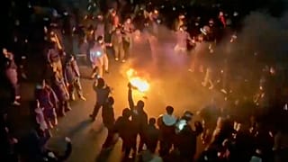 Protesters dancing and cheering around a bonfire as they take to the streets despite an intensifying crackdown in Tehran, 9 January, 2026
