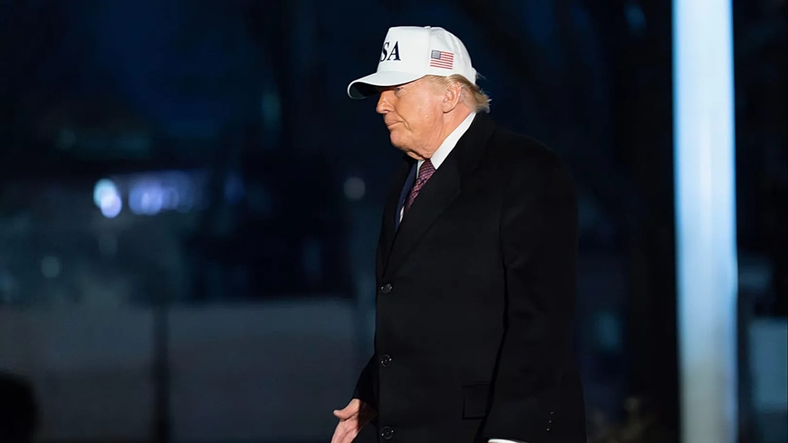 President Donald Trump walks on the South Lawn of the White House, Sunday, Jan. 11, 2026, in Washington. (AP Photo/Jose Luis Magana)
