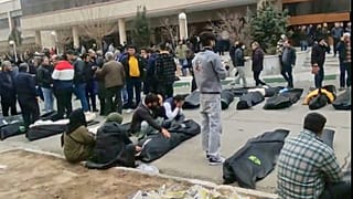 An image from footage circulating on social media shows a morgue with dozens of bodies and mourners after a security crackdown on protesters on the outskirts of Tehran.