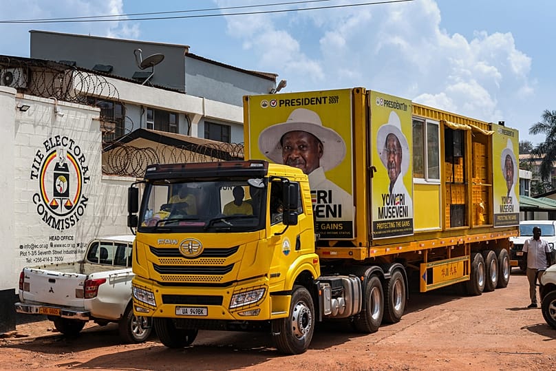 A truck bearing the image of President Yoweri Museveni parks outside the Electoral Commission office in Kampala, Uganda, Wednesday, Jan. 7, 2026.
