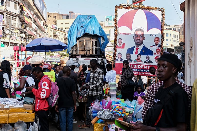 A campaign poster for leading opposition presidential candidate Bobi Wine is displayed in downtown Kampala, Uganda, Wednesday, Jan. 7, 2026.