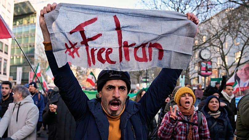 FILE - Protesters participate in a demonstration in Berlin, Germany, in support of the nationwide mass protests in Iran against the government, Jan. 10, 2026.