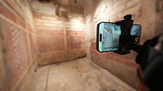 Colosseum Archeological Park guide Valentina uses a head-mounted device to livestream a guided tour of the newly-restored underground House of Griffins.