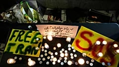 Демонстранты зажигают свечи во время митинга в поддержку антиправительственных протестов в Иране, в Холоне, Израиль, в среду, 14 января 2026 года.