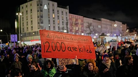 People take part in a rally in support of anti-government protests in Iran, Berlin, Germany, Wednesday, 14 June 2026