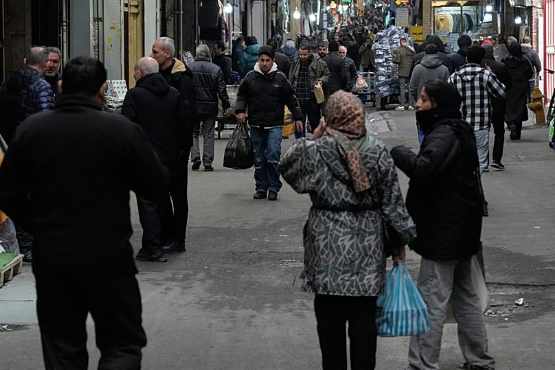People conduct their businesses at Tehran's historic Grand Bazaar, 20 January, 2026