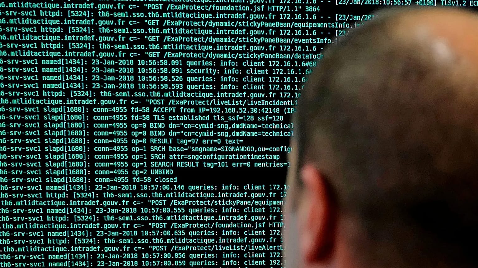 A solider watches code lines on his computer at the International Cybersecurity forum in Lille, 23 January, 2018