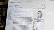 Wikipedia’s founder says AI companies relying on the site’s content should contribute more to its upkeep.
