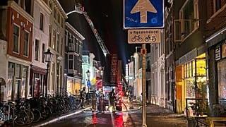Firefighters extinguish the fire at the scene of an explosion in Utrecht, 15 January, 2026