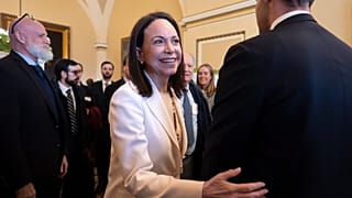 Venezuelan opposition leader Maria Corina Machado is welcomed as she arrives for meetings at the Capitol Hill in Washington