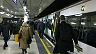 FILE. Passengers arrive at Victoria railway station in London. 2 Jan. 2014.