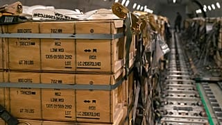 FILE: Pallets of ammunition, weapons and other equipment bound for Ukraine are loaded on a plane  at Dover Air Force Base, 30 January 2022
