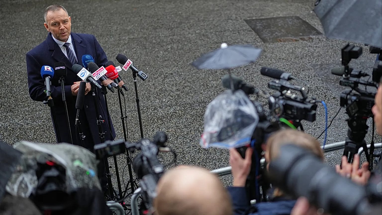 FILE: Poland President Karol Nawrocki speaks to the media following a meeting with Britain's Prime Minister Keir Starmer, at Downing Street in London, 13 January 2026