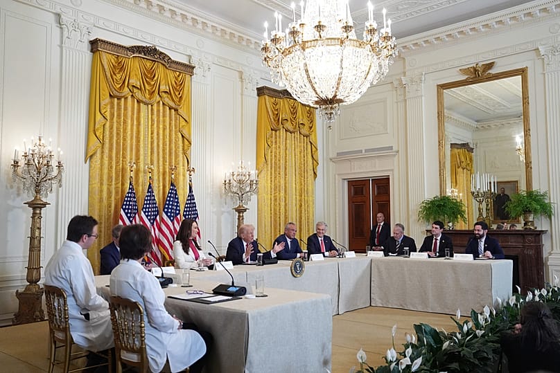US President Donald Trump speaks during an event to promote investment in rural health care in the East Room of the White House, Friday, Jan. 16, 2026, in Washington