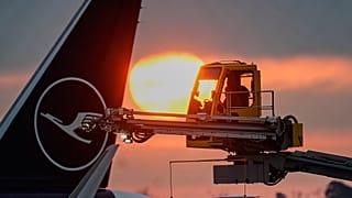 FILE: The sun rises as a Lufthansa's aircraft is de-iced at the airport in Frankfurt, as temperatures dropped to -6 degrees Celsius, 5 January 2026