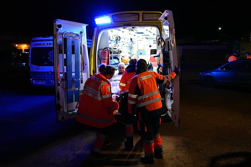 An injured person is transported by ambulance in Adamuz, 19 January, 2026