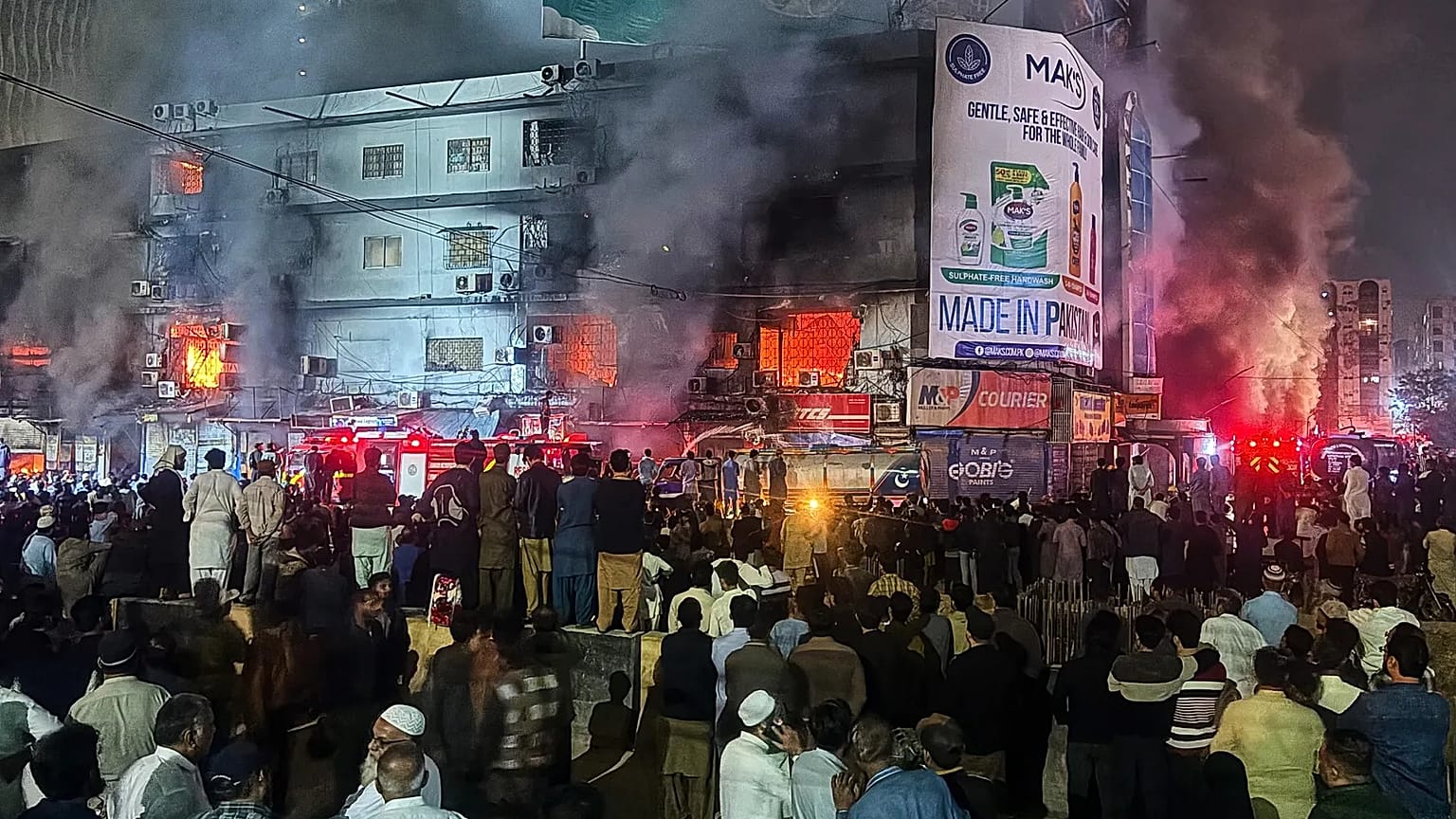Firefighters try to control a massive fire that was broke out in a multi-story shopping mall in Karachi, 18 January, 2026