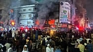 Firefighters try to control a massive fire that was broke out in a multi-story shopping mall in Karachi, 18 January, 2026