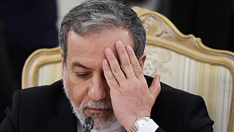 Iranian Foreign Minister Abbas Araghchi gestures during a meeting with Russian Foreign Minister Sergey Lavrov at Zinaida Morozova's Mansion in Moscow, Wednesday, Dec. 17, 2025