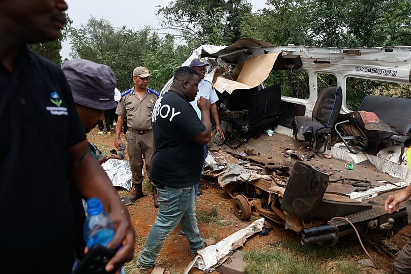 Police inspect the scene of a collision between a truck and a minibus carrying school children in Vanderbijlpark, 19 January, 2026