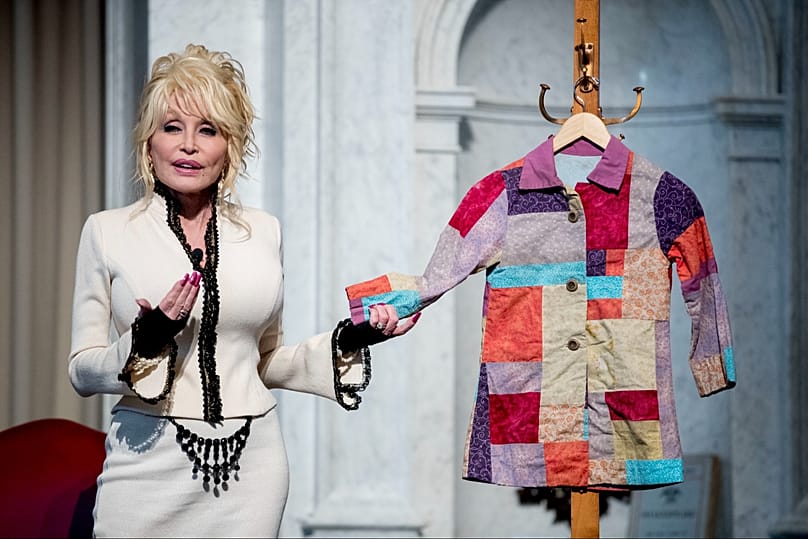 FILE: Dolly Parton's 100 millionth book, 'Coat of Many Colors' was donated to the US Library of Congress collection in Washington, Feb 2017 