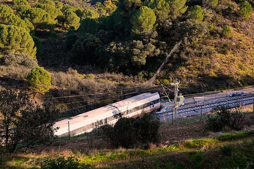 Part of a wrecked train is photographed at the site of a train collision in Adamuz, 19 January, 2026