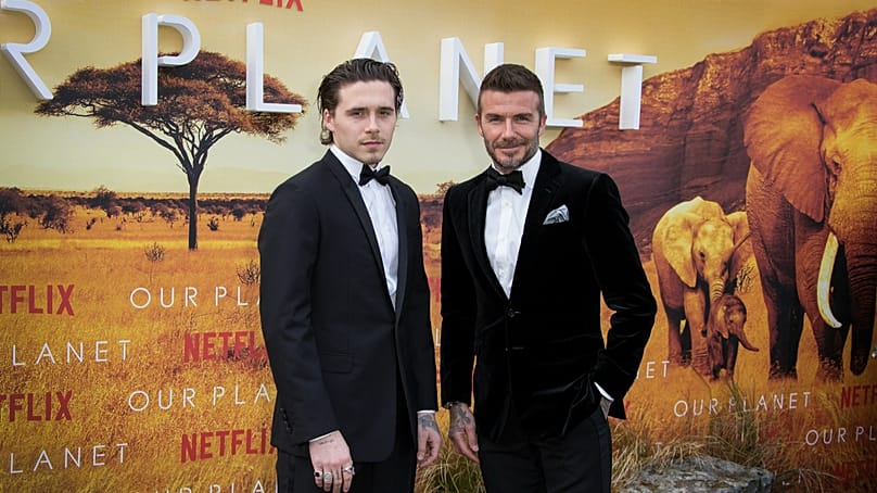 FILE: Brooklyn Beckham with his father David Beckham at the premiere for Our Planet at London's Natural History Museum, 4 Oct 2019 