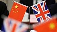 Flags of China and the Union Jack stand during the China-UK Energy Dialogue in Beijing, 17 March, 2025