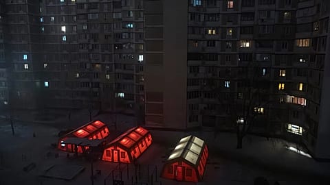 Emergency tents are set up in a residential neighbourhood where people can warm up following Russia's regular air attacks in Kyiv, 15 January, 2026