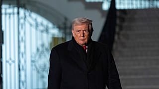US President Donald Trump walks speak with reporters before departing on Marine One from the South Lawn of the White House, Tuesday, Jan. 20, 2026, in Washington. 
