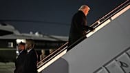 President Donald Trump boards Air Force One for a trip to attend the World Economic Form in Davos, Tuesday, Jan. 20, 2026, at Joint Base Andrews