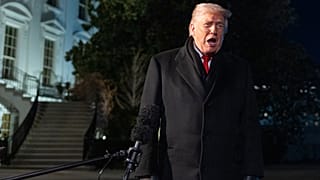 President Donald Trump speaks before departing on Marine One from the South Lawn of the White House, 20 Jan 2026, in Washington.