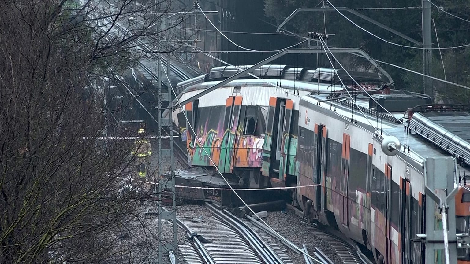 A commuter train hit a retaining wall that collapsed onto the tracks after heavy rainfall, Gelida, Spain, Jan. 21, 2026