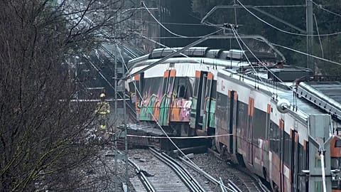 A commuter train hit a retaining wall that collapsed onto the tracks after heavy rainfall, Gelida, Spain, Jan. 21, 2026