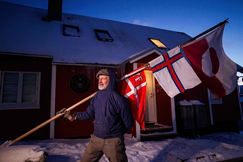Jens Kjeldsen protests against Trump's policy towards Greenland in front of the US consulate in Nuuk, Greenland, on Tuesday, Jan. 20, 2026. (AP Photo/Evgeniy Maloletka)
