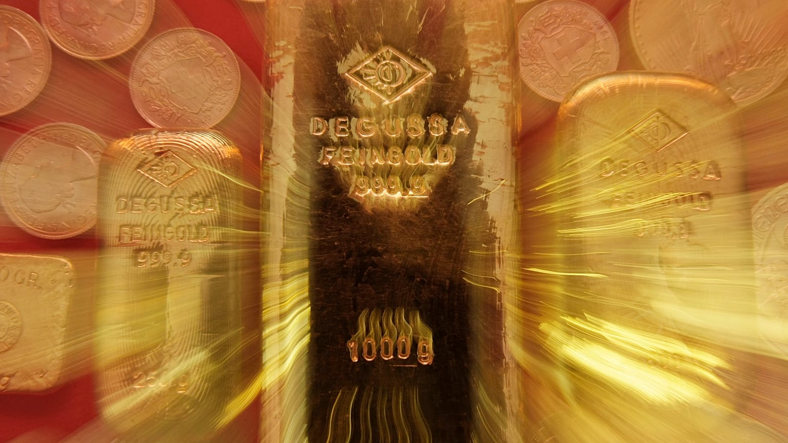 FILE. Gold bullions and bullion coins are seen on this zoomed photo in the German BW-Bank in Stuttgart, Germany. 18 March 2008.