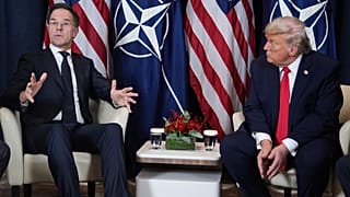 President Donald Trump, right, meets with NATO Secretary General Mark Rutte on Wednesday evening in Davos, Switzerland.