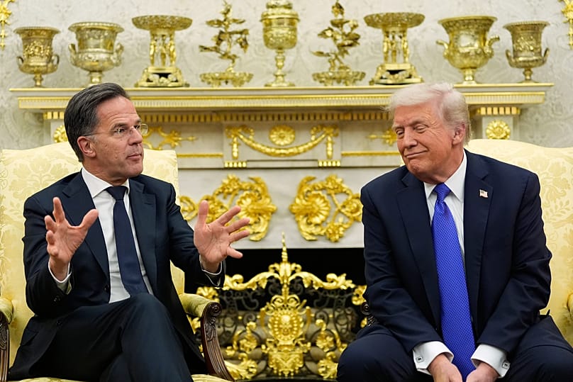 President Donald Trump meets with NATO Secretary General Mark Rutte in the Oval Office of the White House, in Washington on 22 October 2025.
