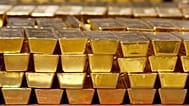 Gold bars are stacked in a vault at the United States Mint, 22 July, 2014