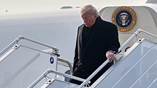 President Donald Trump steps off Air Force One after arriving at Zurich International Airport for the World Economic Forum. 21 January 2026
