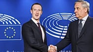FILE. Former European Parliament President Antonio Tajani, right, welcomes Facebook CEO Mark Zuckerberg upon his arrival at the EU Parliament in Brussels. 22 May 2018. 
