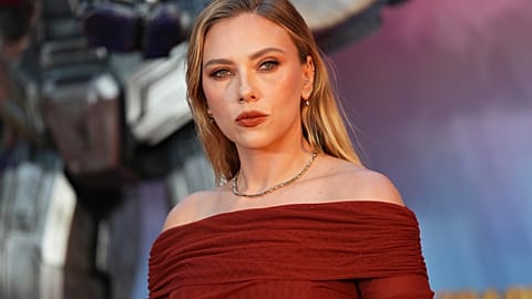 FILE - Scarlett Johansson poses for photographers upon arrival at the premiere for the film 'Transformers One' o, Sept. 19, 2024, in London. 