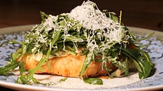 A croissant base, with lobster, poached egg, rocket and shaved Parmesan served at Pavyllon restaurant in London.