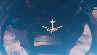 A Tu-95 strategic bomber of the Russian air force is seen through the cockpit glass dome during a patrol mission, provided by the Russian Defence Ministry, Jan. 21, 2026